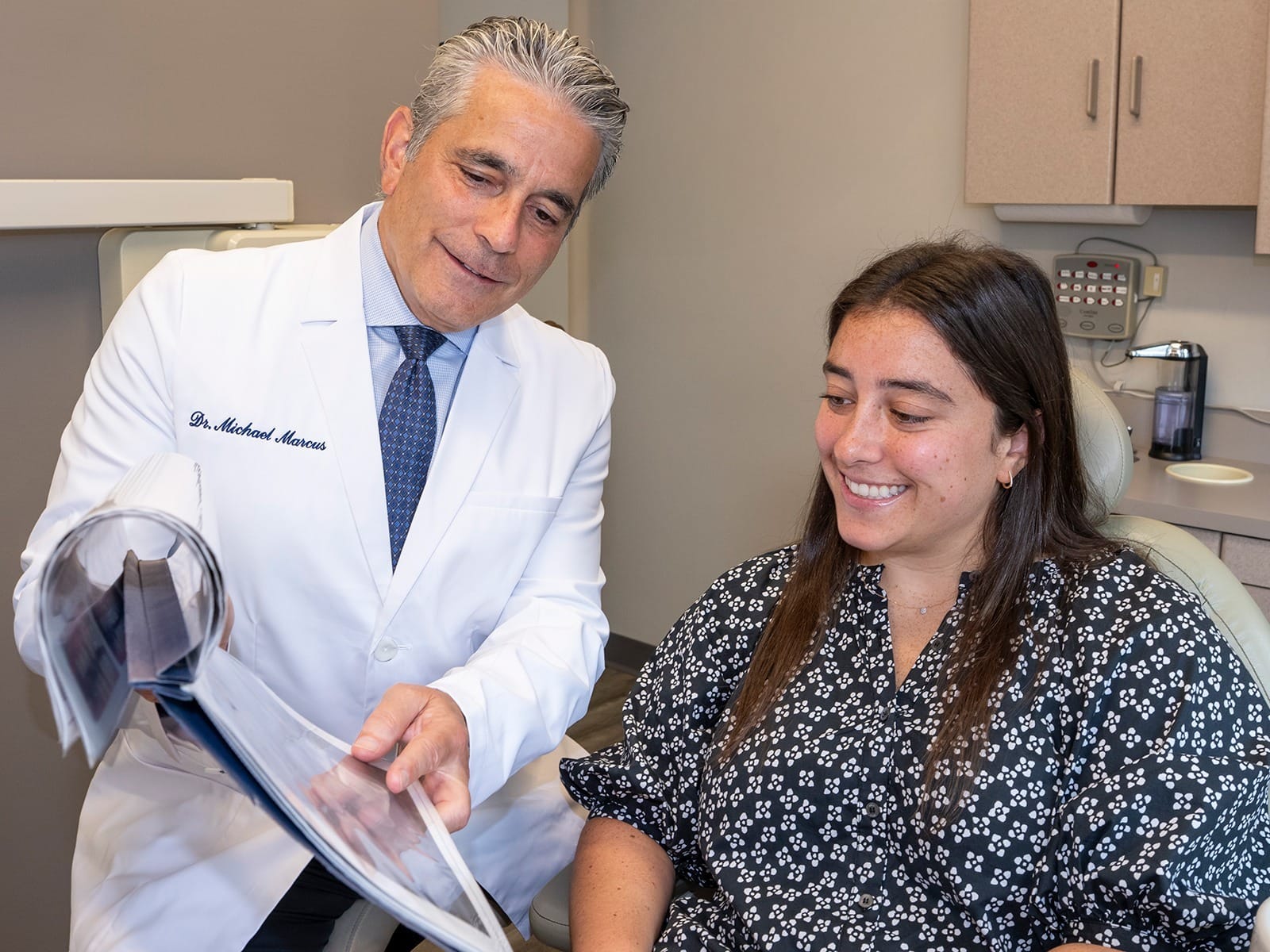 Doctor consulting with patient in office.