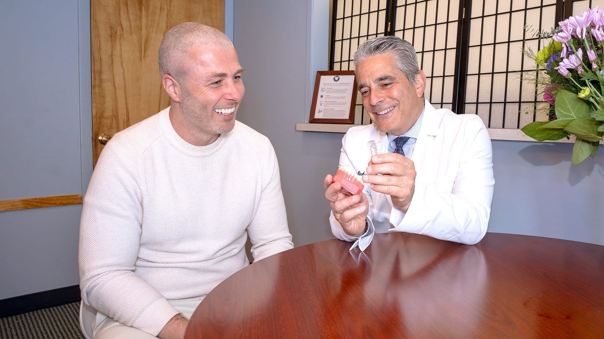 Doctor discussing treatment with patient.