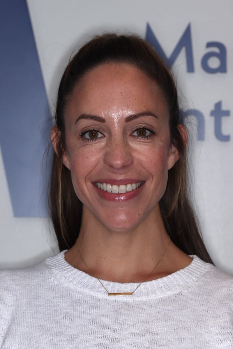 Person wearing a white sweater.